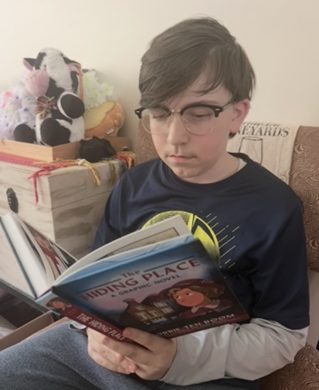 Kingston reading The Hiding Place, borrowed from his aunt in Amsterdam